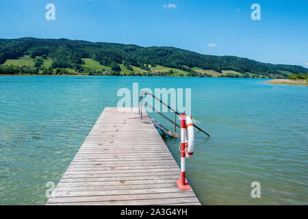 The wooden bridge of the Irrsee in the Salzkammergut Stock Photo