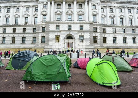 Tents down Horse Guards Road, outside the Treasury building, during an ...