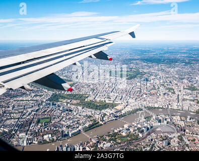 View from plane window over River Thames & Westminster: London Eye, St James Park, Regent's Park & Waterloo station, London, England, UK Stock Photo