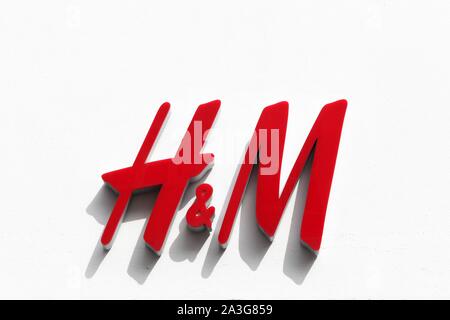 Copenhagen, Denmark - August 4, 2019: H & M logo on a facade. H & M is a swedish multinational retail clothing company Stock Photo