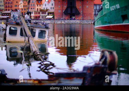 Boat wreck in the marina of Gdańsk (Danzig in German) a port city on the Baltic coast of Poland Stock Photo