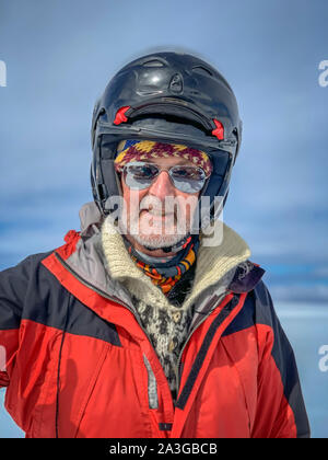 Portrait -man wearing a helmet.The Glaciological Society trip, Mt. Kerlingafjol, Hofsjokull Ice Cap, Central Highlands, Iceland Stock Photo
