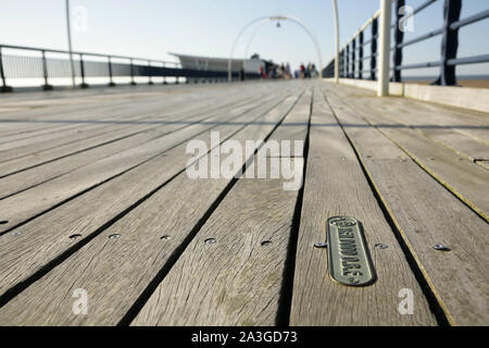 Plaque in honour of the comedian Ken Dodd on Southport pier, UK. Stock Photo