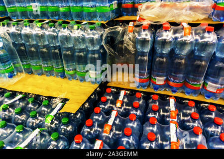 Bottled water in plastic bottles Supermarket Stock Photo