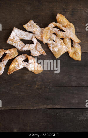 Fat Thursday. Traditional shortbread sweets with powdered sugar. Stock Photo