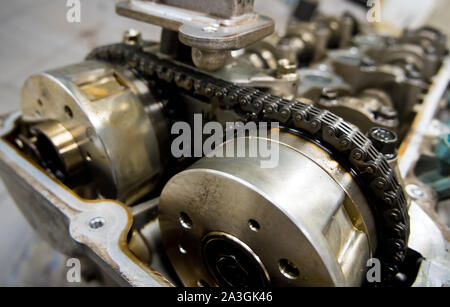 Timing chain drive in a car engine Stock Photo