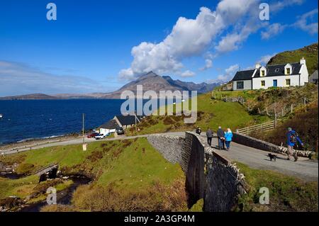 United Kingdom, Scotland, Highlands, Hebrides, Isle of Skye, Elgol village on the shores of Loch Scavaig towards the end of the Strathaird peninsula and the Black Cuillin Mountains in the background Stock Photo