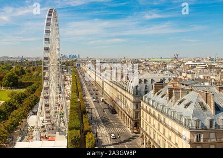 France, Paris, the rue de Rivoli and the funfair of the Tuileries with the Grande Roue Stock Photo