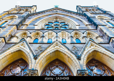 View from below of the facade of: Our Lady of Guadalupe at St. Bernard's Chelsea, NYC Stock Photo