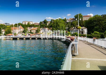 View of the pier, buildings and port in the city of Thonon les Bains on Lake Geneva. Stock Photo