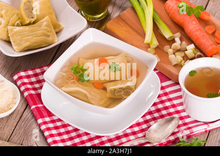 Maultaschen - swabian filled pasta ( ravioli ). Stock Photo