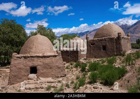 China, Xinjiang, Pamir highlands, pastures and semi nomadic tadjik communities of Taxkorgan, tadjik tumbs, adobe Stock Photo