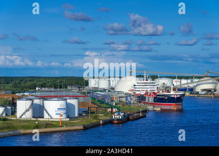 The port facilities along the Daugava River, in Riga, Latvia. Stock Photo