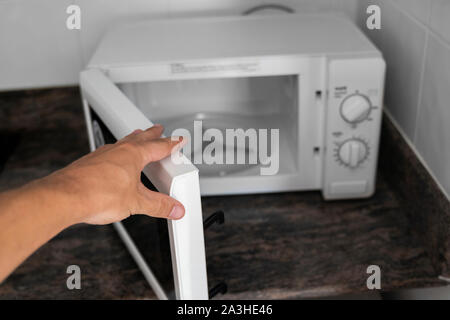 Heating Food In A Microwave Oven Stock Photo, Picture and Royalty Free  Image. Image 178439242.