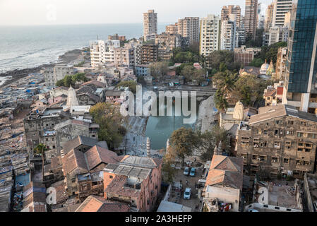 The Banganga tank is an ancient water tank that forms part of the Walkeshwar Temple complex in Malabar Hill area of Mumbai in India. Stock Photo