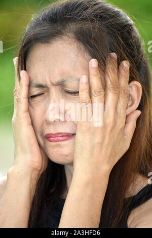 A Dementia And Filipina Person Stock Photo