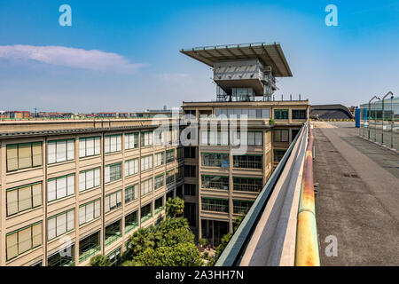 The Lingotto building built by FIAT the Italian car manufacturer ,now a shopping and entertainment complex with a roof top car test track ,Turin Italy Stock Photo