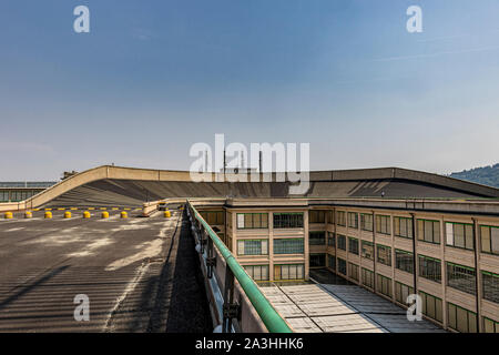 The Lingotto building built by FIAT the Italian car manufacturer ,now a shopping and entertainment complex with a roof top car test track ,Turin Italy Stock Photo