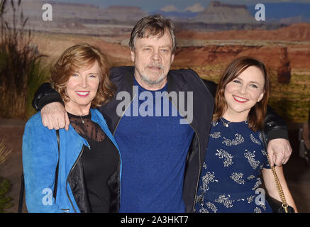 WESTWOOD, CA - OCTOBER 07: (L-R) Marilou York, Mark Hamill and Chelsea Hamill attend the premiere of Netflix's 'El Camino: A Breaking Bad Movie' at Regency Village Theatre on October 07, 2019 in Westwood, California. Stock Photo