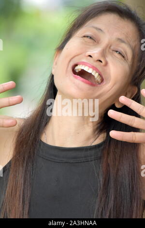 A Minority Female Senior Laughing Stock Photo