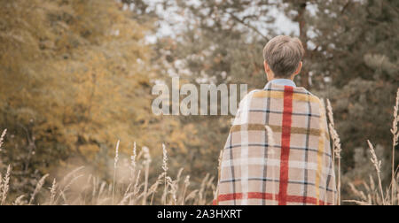 Depression concept - female in front of autumn nature Stock Photo