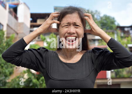 A Dementia And Minority Person Stock Photo
