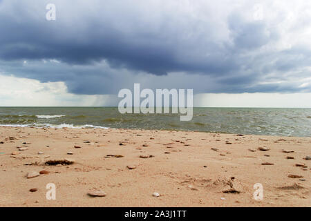 Weather front coming over sea, storm is approaching. One minute before the hurricane. Cyclone background. Stock Photo