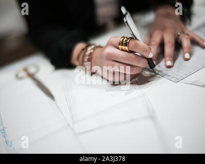 Fashion Stylist Working at her project Stock Photo