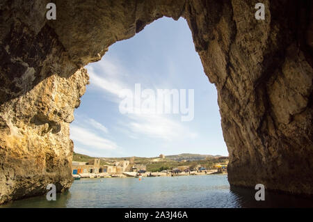 Boat trip inside the cave leading to Inland Sea in Dwejra, Lawrenz, Gozo, Malta Stock Photo
