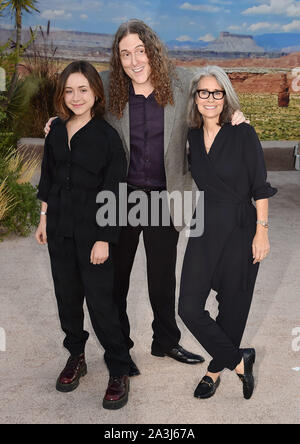 WESTWOOD, CA - OCTOBER 07: (L-R) Nina Yankovic, Weird Al Yankovic and Suzanne Yankovic attend the premiere of Netflix's 'El Camino: A Breaking Bad Movie' at Regency Village Theatre on October 07, 2019 in Westwood, California. Stock Photo