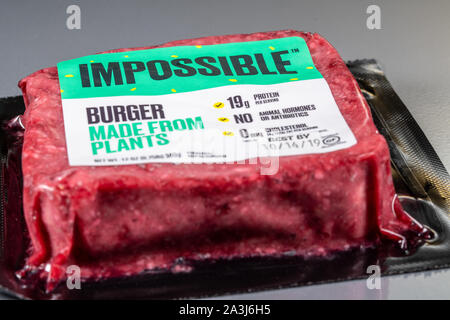 MORGANTOWN, WV - 8 October 2019: Packaging for Impossible Foods burger made from plants on steel background Stock Photo