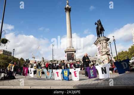 London, UK. 08th Oct, 2019. Demonstration t-shirts at Trafalgar Square during the environmental protest by Extinction Rebellion activist group.Extinction Rebellion is an international movement that uses non-violent civil disobedience in an attempt to halt mass extinction and minimise the risk of social collapse. The group has blocked a number of key junctions in central London. Credit: SOPA Images Limited/Alamy Live News Stock Photo