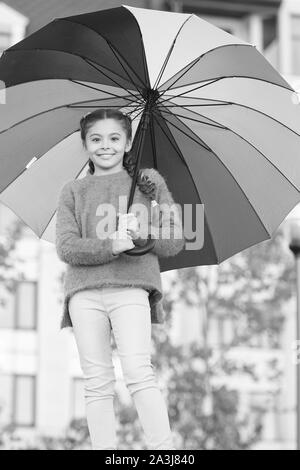 Girl child long hair with umbrella. Colorful accessory positive influence. Bright umbrella. Stay positive and optimistic. Everything better with my umbrella. Colorful accessory for cheerful mood. Stock Photo