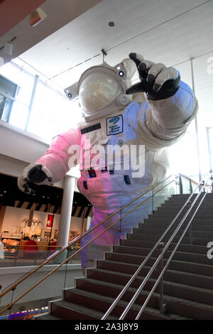 Large astronaut model by the stairs at the Science Museum of Minnesota. St Paul Minnesota MN USA