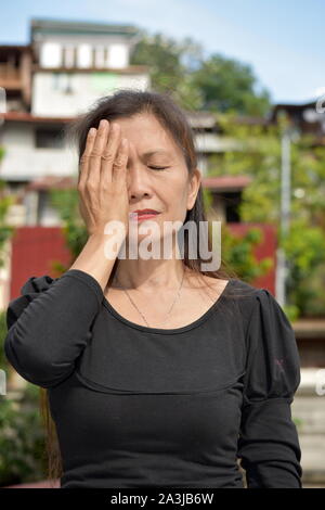 An Old Asian Granny And Dementia Stock Photo - Alamy