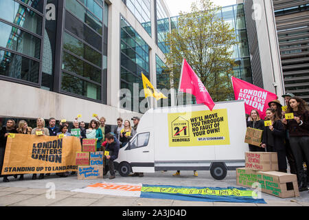 London, UK. 8 October, 2019. Campaigners from Generation Rent UK and London Renters Union protest alongside a replica of a removal van outside the Ministry of Housing, Communities and Local Government against renters being evicted under 1988 Housing Act law which allows landlords to kick out tenants without a reason. The Government is scheduled to debate ending this part of the law on 12th October. Credit: Mark Kerrison/Alamy Live News Stock Photo