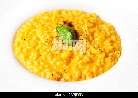 Risotto with saffron and vegetable ice-cream, close-up Stock Photo