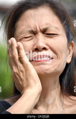 A Crying Female Senior Stock Photo