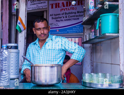 Indian man in Asalfa  neighbourhood in Mumbai, India Stock Photo