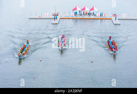 Dragonboat teams racing during the 2019 Taipei Dragon Boat festival in Taipei Taiwan Stock Photo