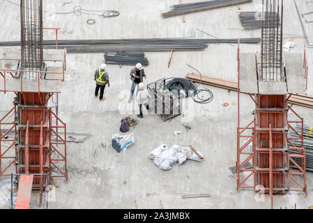 High angle construction workers Stock Photo