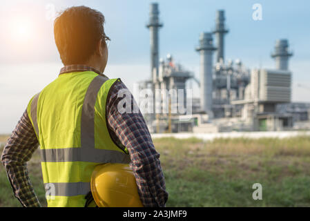 Engineers working in power stations. Stock Photo