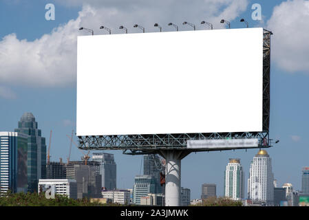 Road with lanterns and large blank billboard at evening in city : Bangkok : Thailand Stock Photo