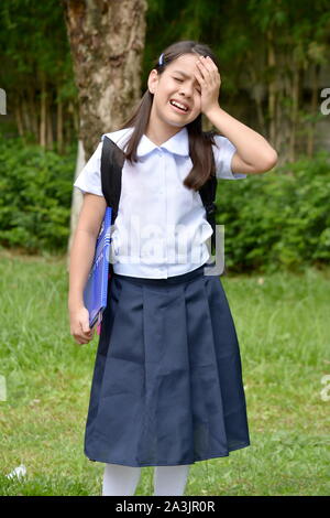 Girl Student And Anxiety Wearing Uniform Stock Photo