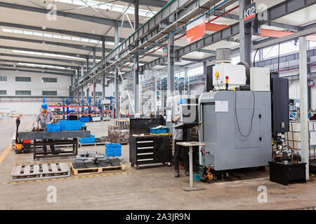 Metal sheet profiling factory. New modern machine. Industrial and manufacturing concept Stock Photo
