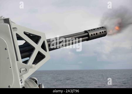 191003-N-NH257-0017  PACIFIC OCEAN (Oct. 3, 2019) The Phalanx close-in weapons system is test fired during a live-fire exercise aboard the aircraft carrier USS Nimitz (CVN 68). Nimitz is currently underway conducting routine operations. (U.S. Navy photo by Mass Communication Specialist Seaman Elliot Schaudt) Stock Photo