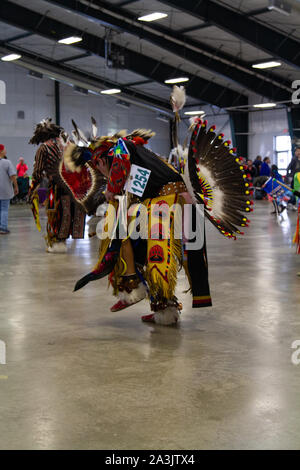 Native American dancer dressed in full regalia at a Pow Wow where traditions, culture, dancing, drumming, and singing are on display, Montana, USA. Stock Photo
