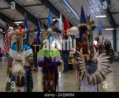 Young indigenous boys dressed in full regalia at a Pow Wow where traditions, culture, dancing, drumming, and singing are on display, Montana, USA. Stock Photo