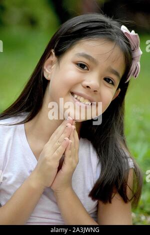 A Minority Youth Praying Stock Photo