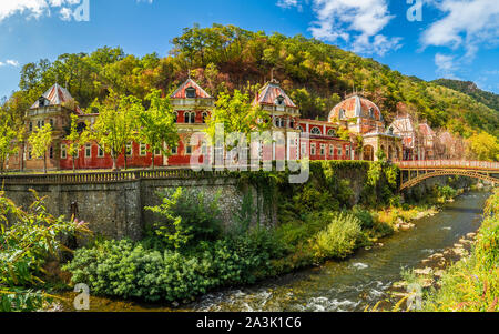 Old abandoned buildings in Baile Herculane town, Cerna Valley of  Domogled National Park, Romania Stock Photo